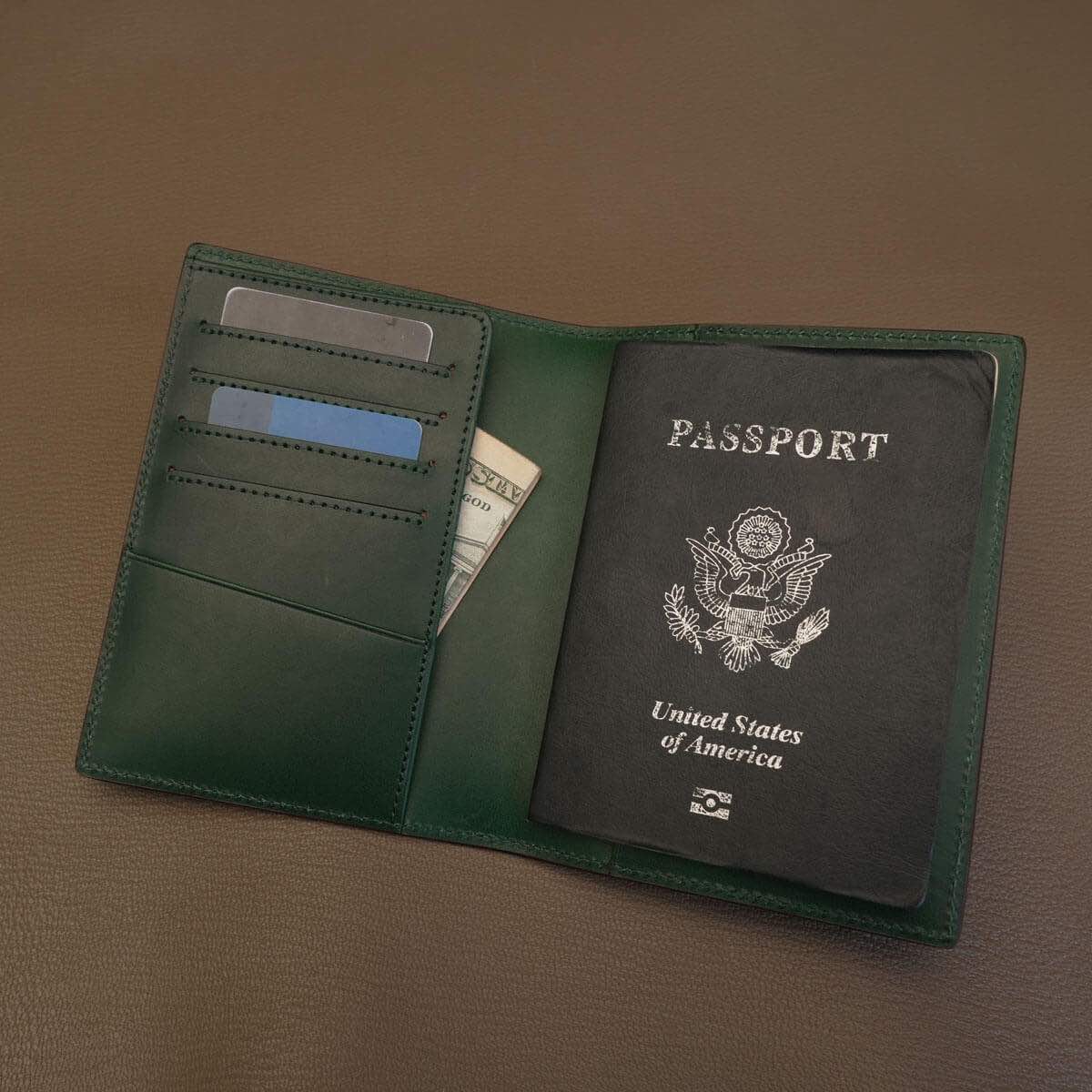 Interior layout of green Italian leather passport wallet with 4 credit card slots and boarding pass holder.