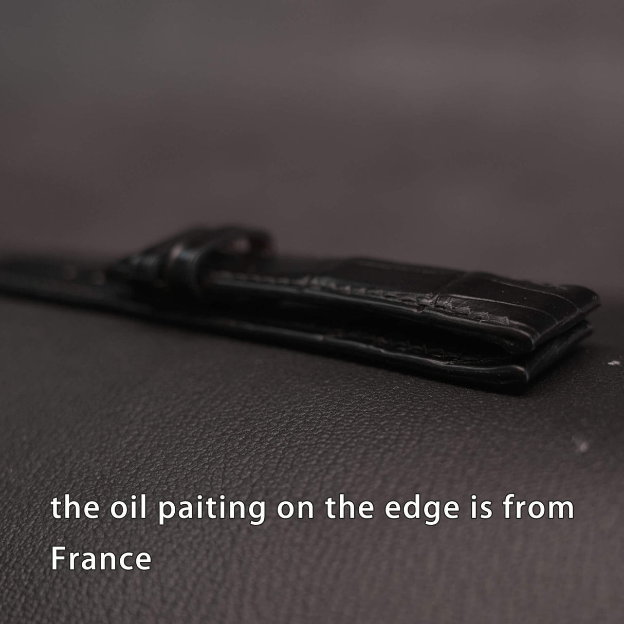 Side view showing smooth hand-painted edge burnishing and clean structural profile of the custom luxury alligator watch strap.