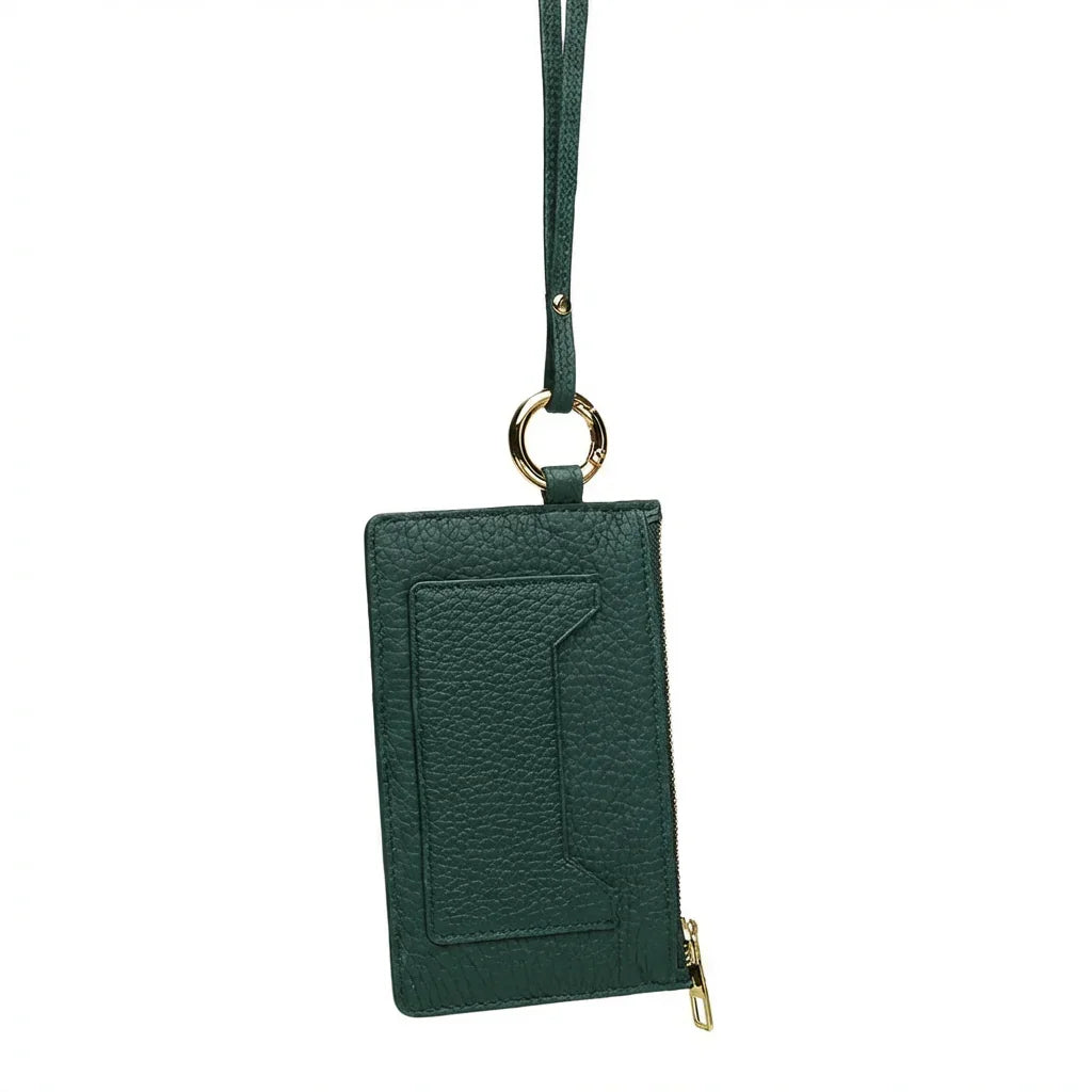 Green leather card holder with strap on a white background