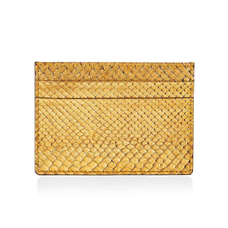 Gold python skin cardholder on a white background