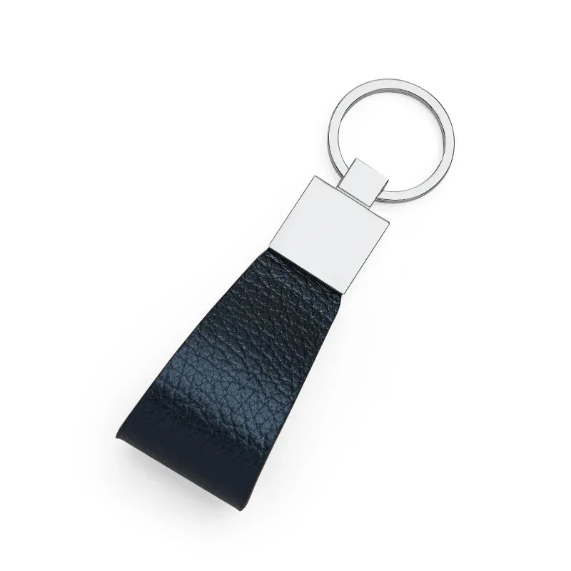 trim navy leather keychain with silver ring on a white background