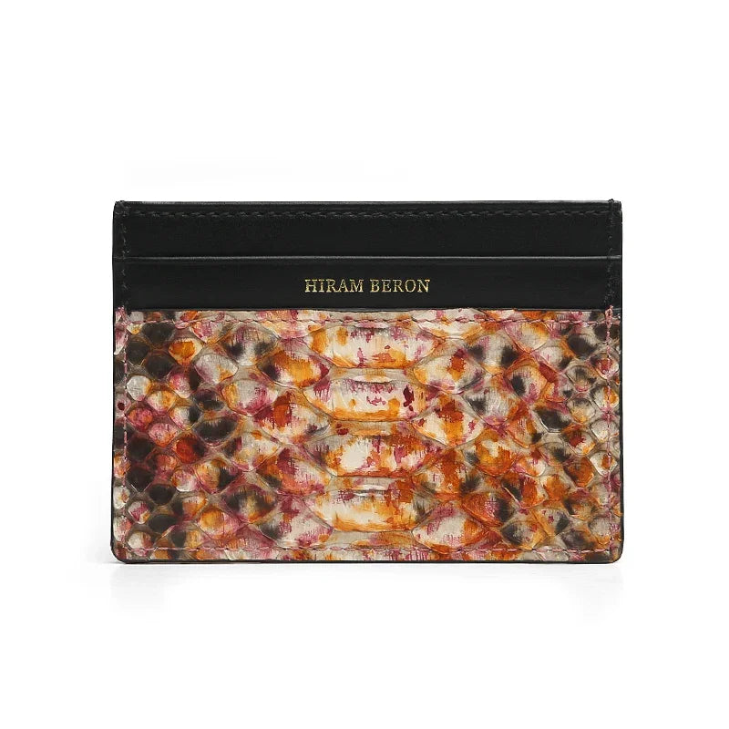 Cardholder with multicolored python skin and black top section on a white background