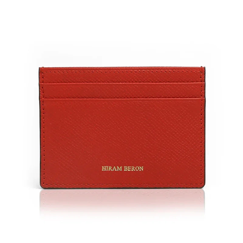 Red cardholder with 'Hiram Beron' branding on a white background