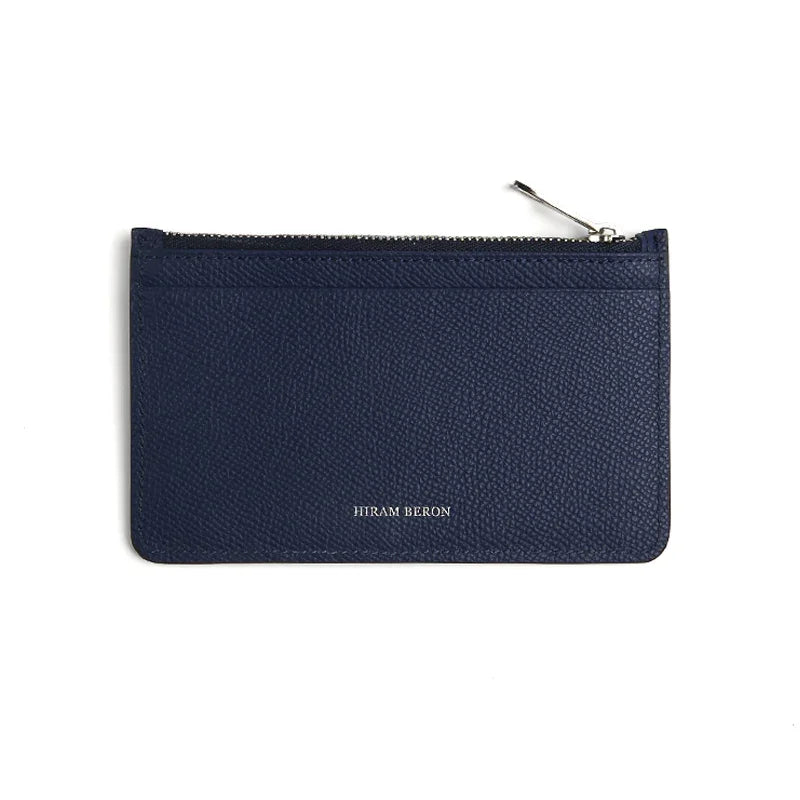 Navy blue zipper card wallet with 'Hiram Beron' branding on a white background