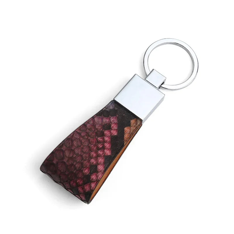 Keychain with a rose snak skin leather strap on a white background