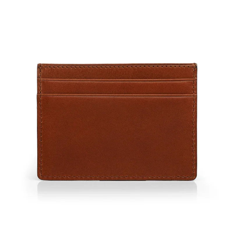 the back of brown vegetable tanned leather ccard case with white background
