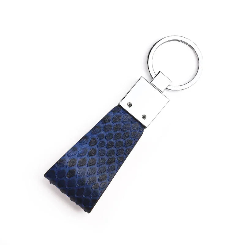 Keychain with blue python skin strap on a white background