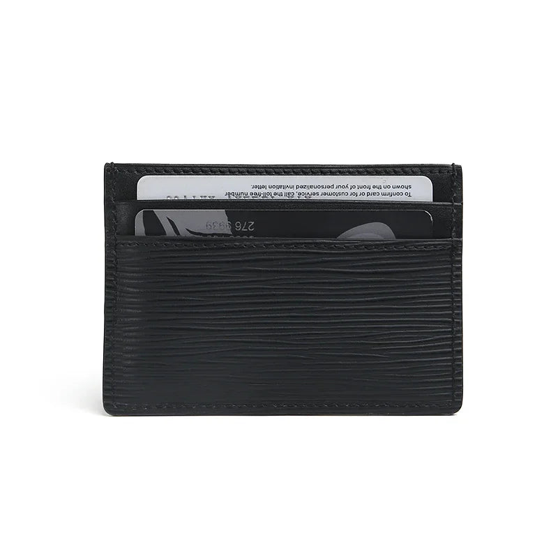 back view of Black EPI leather cardholder with cards on a white background