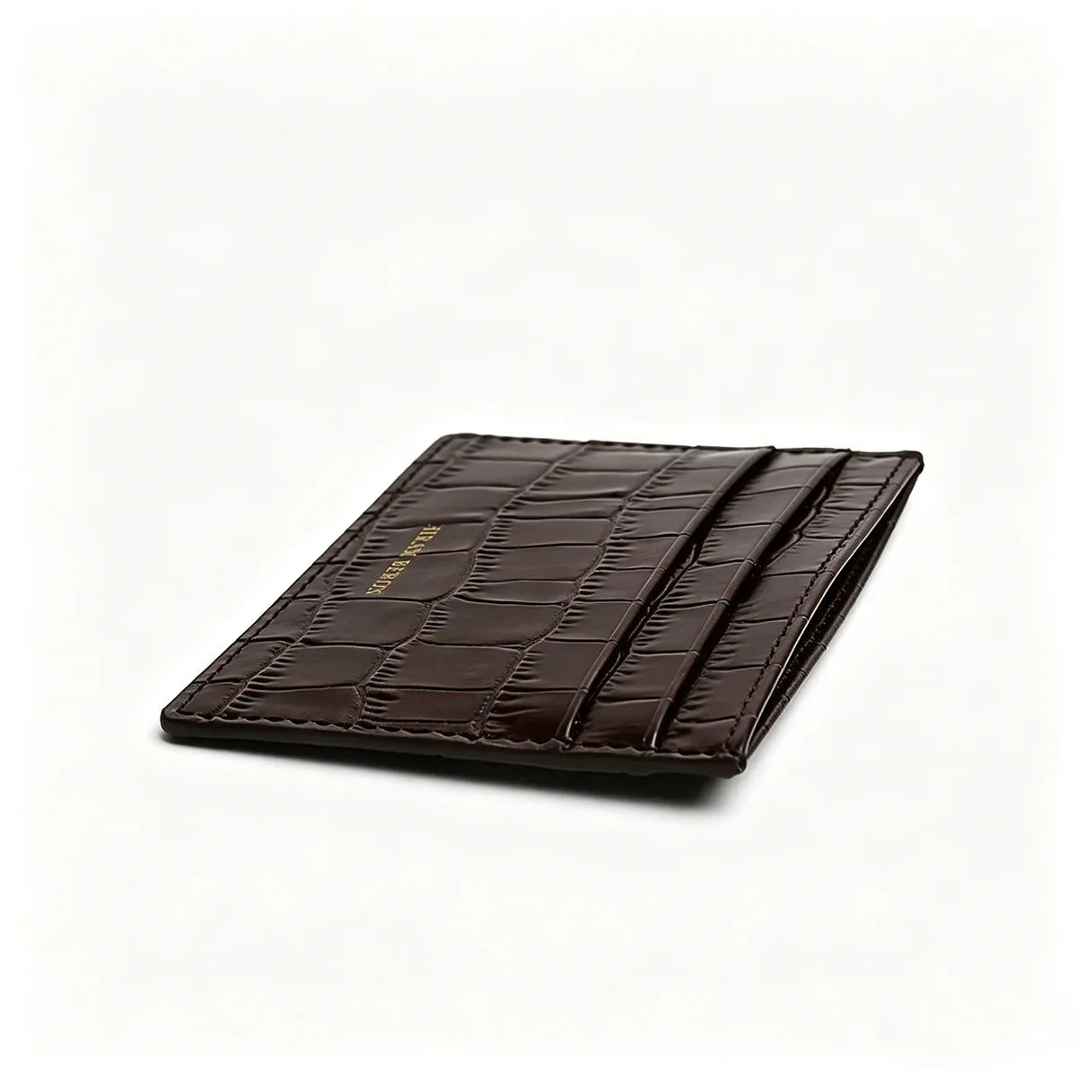 Brown crocodile-patterned wallet on a white background