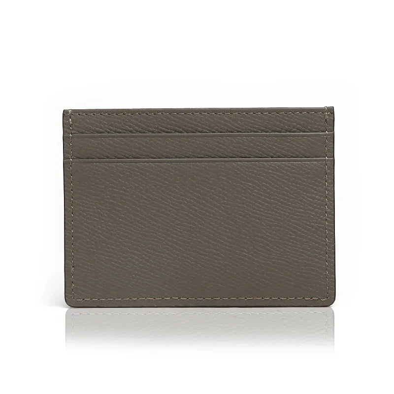grey leather cardholder on a white background