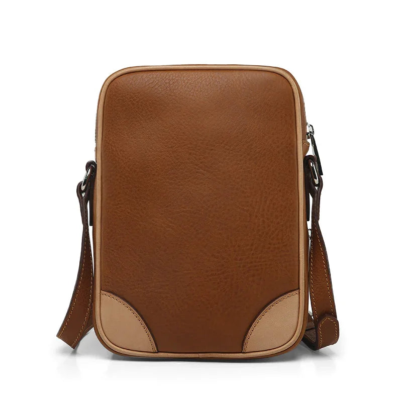 the back of the brown -Leather Reporter Bag