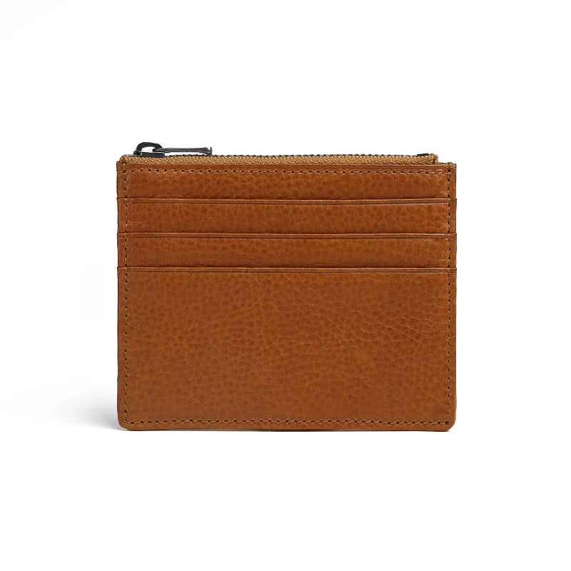 Brown leather card case with a zipper on a white background