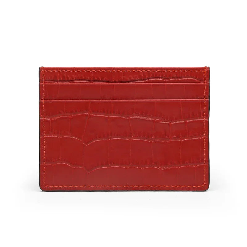 Red crocodile-patterned cardholder on a white background