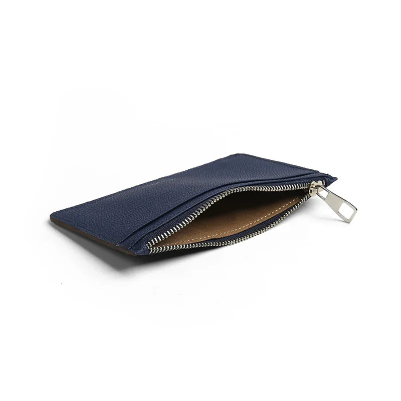 the detail of top zipper pocket for the navy blue leather card holder