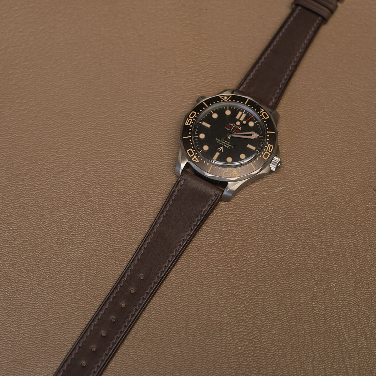 Complete dark brown Badalassi Carlo Minerva Liscio leather watch band mounted on luxury titanium dive watch