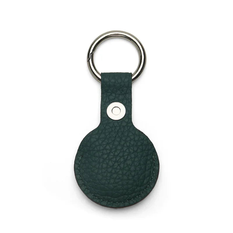 the back of the green pebble leather airtag holder