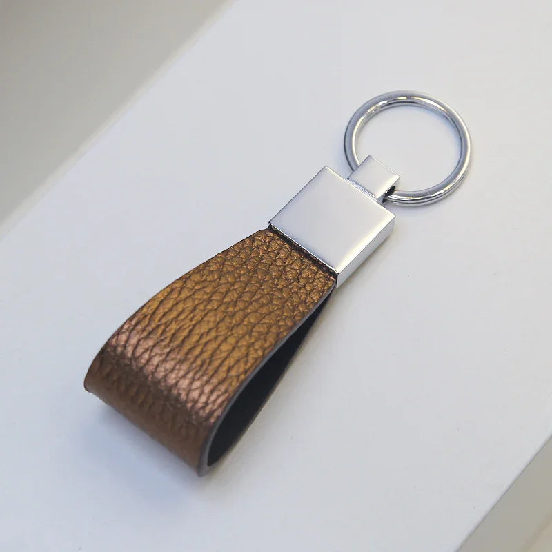 Close-up of premium anti-scratch metal clasp on a leather key ring
