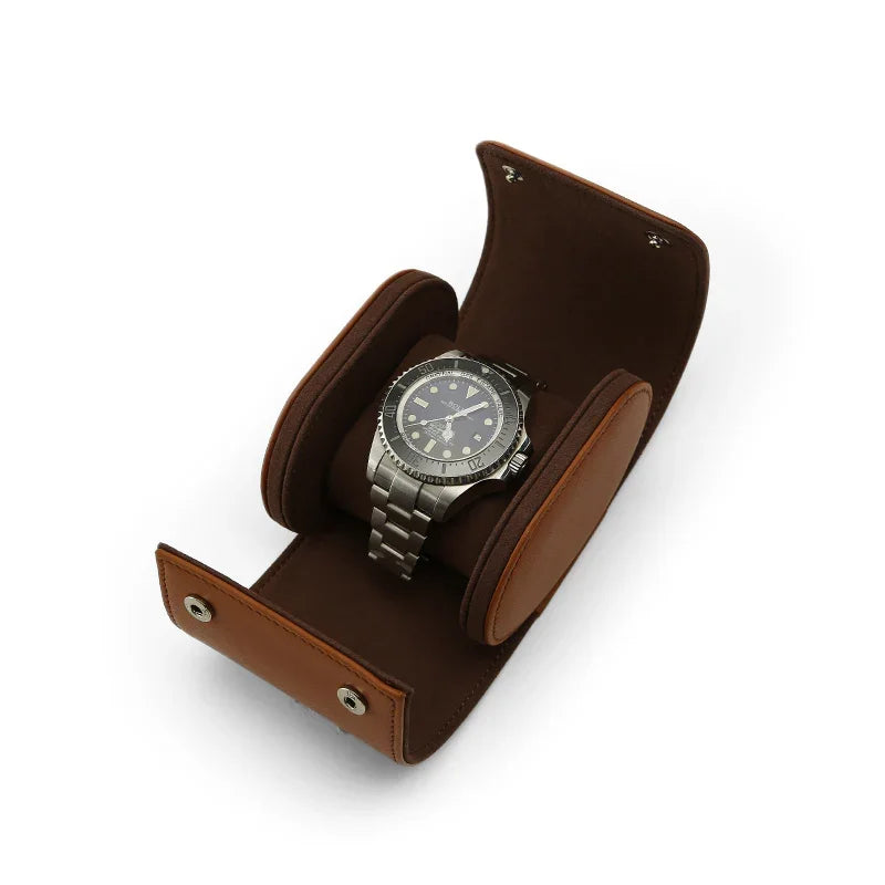 Brown leather watch holder with a silver watch on a white background