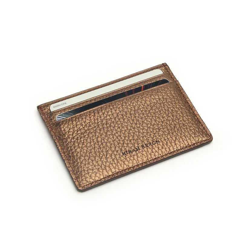 trim bronzo leather cardholder with visible brand name "HIRAM BERON"on a white background