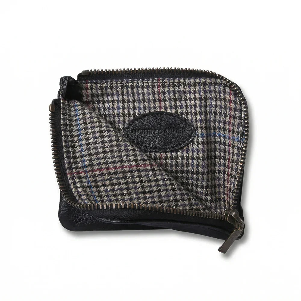 black goat skin coin pouch with a brand logo "HIRAM BERON" on a white background