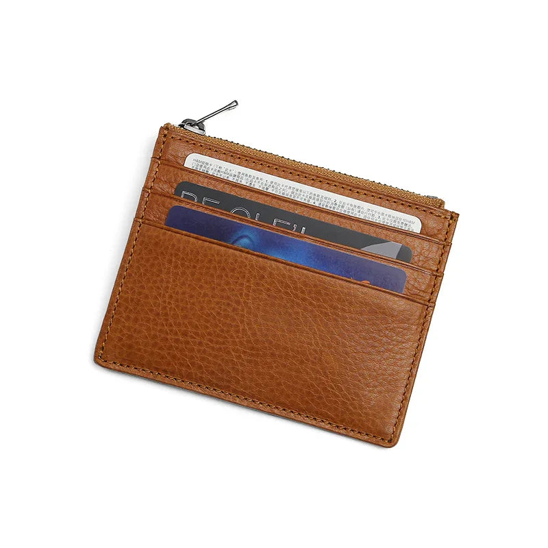 Brown leather wallet with 3 card slots on a white background