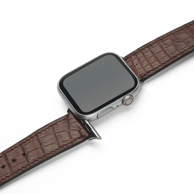 Smartwatch with a brown leather strap on a white background