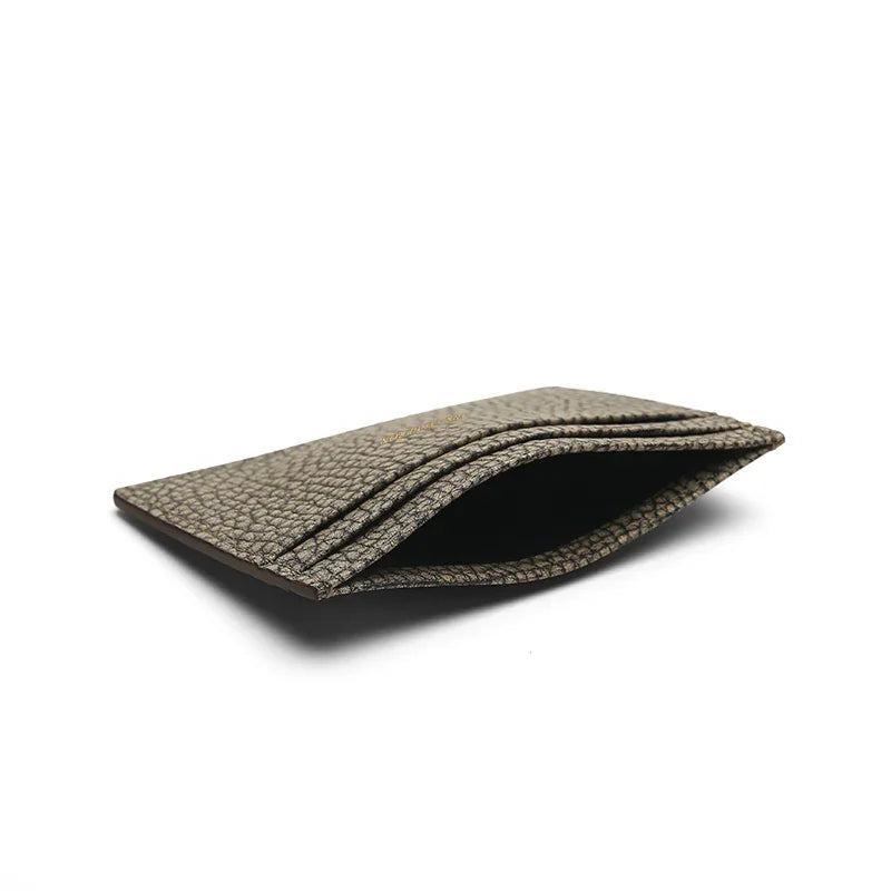 detail of the top pocket of the grey card holder