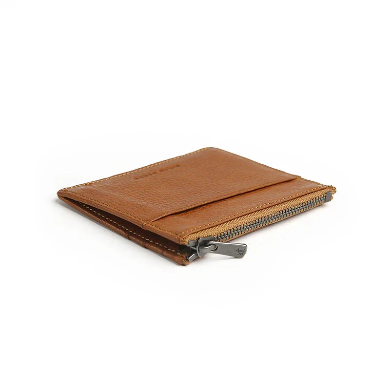 detail of zippper puller for zipper card case with a white background