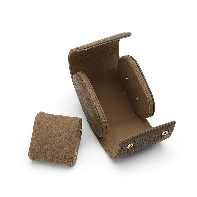Opened pebble grain leather watch roll in etoupe with matching cushion for wholesale.