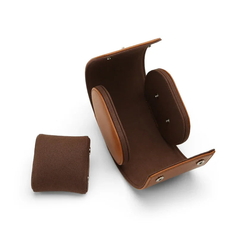 Opened Italian calfskin watch roll in brpwn with matching cushion for wholesale