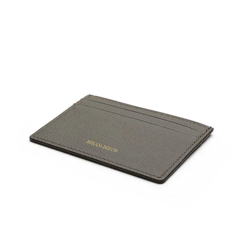 Gray cardholder with brand name on a white background