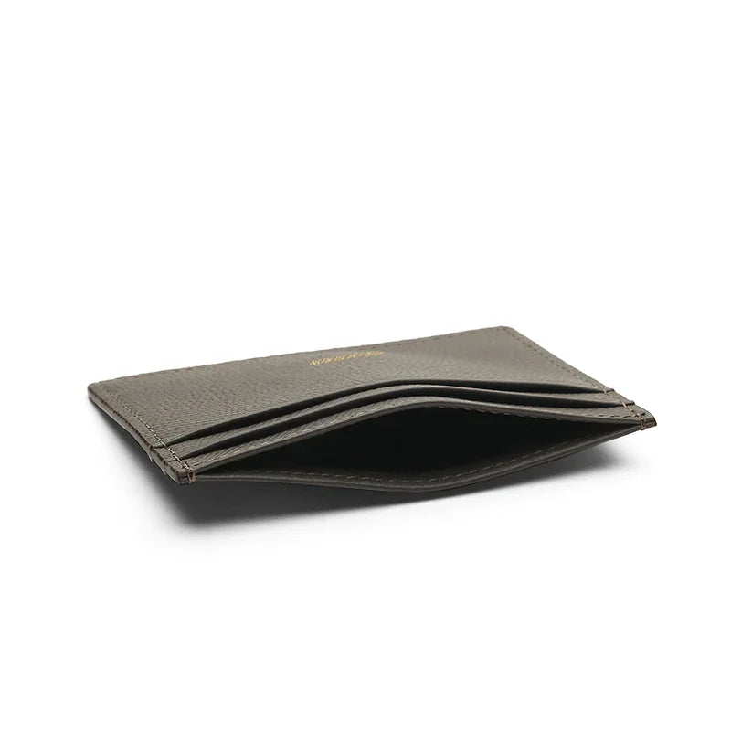 the detail of the top pocket for the grey card holder