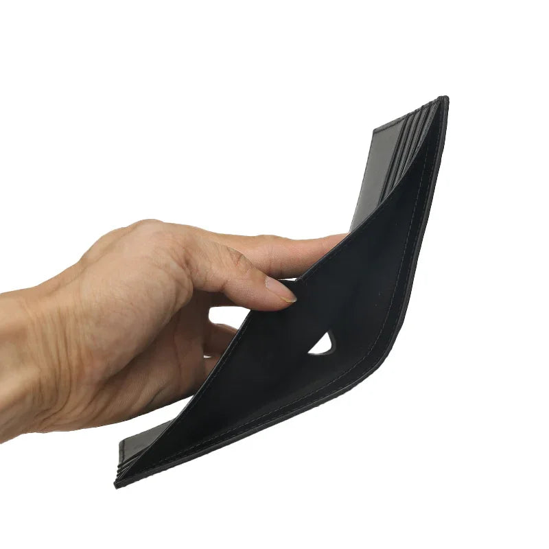 close-up of the top money pocket for the black leather wallet