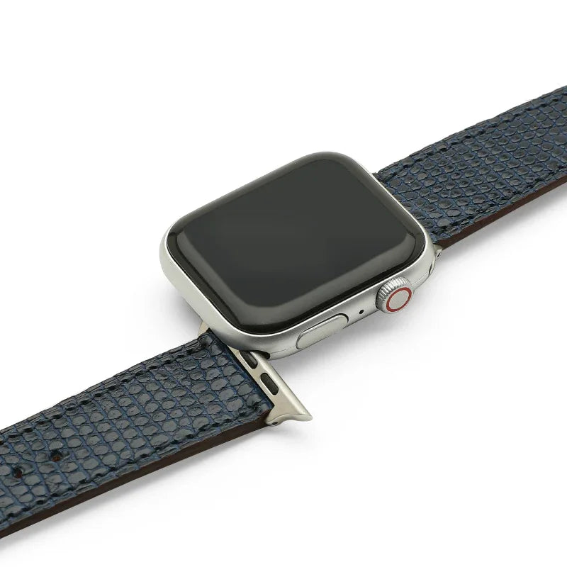 Smartwatch with blue lizard skin watch strap on a white background