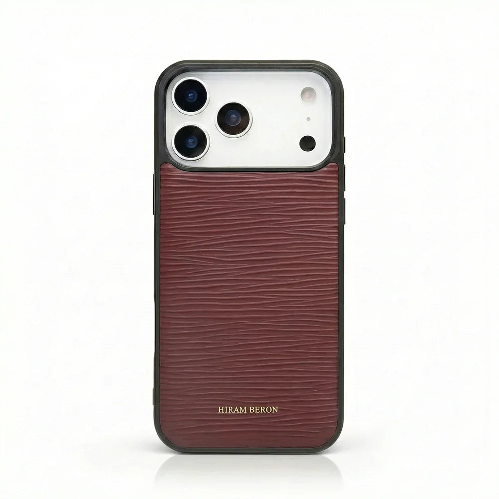 burgundy epi leather iphone case with HIRAM BERON brand name on it