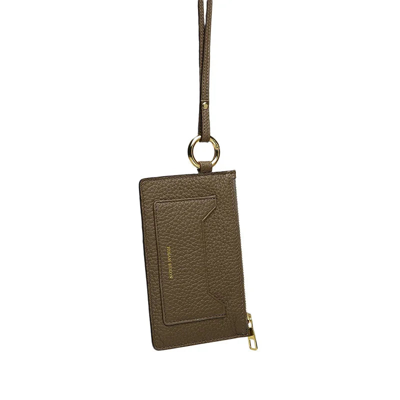 Etoupe leather lanyard wallet with a strap on a white background