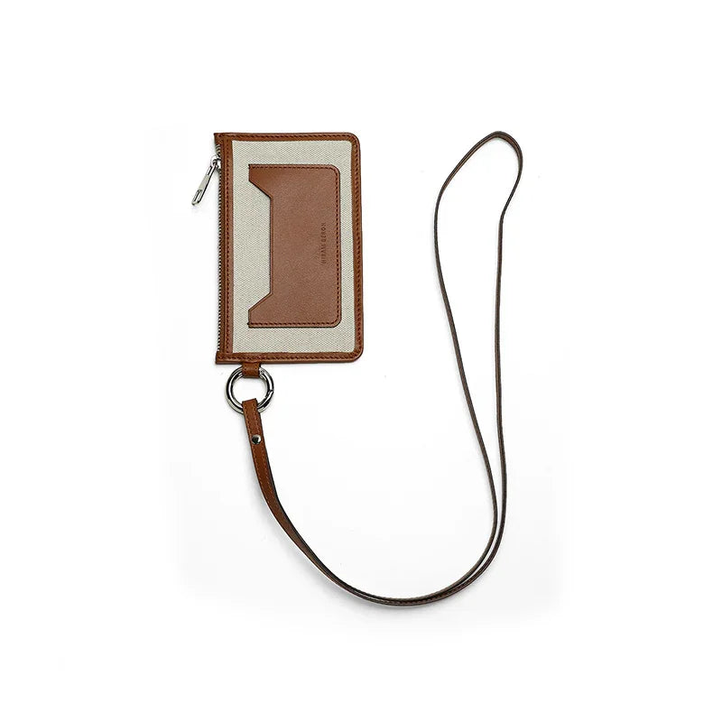 card wallet with a strap on a white background
