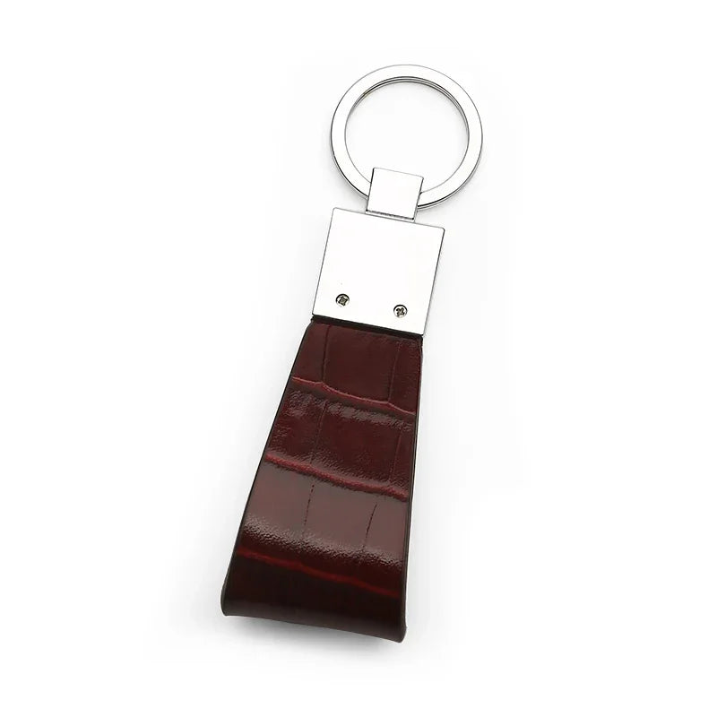 The back of the Brown leather keychain with silver metal tag on a white background