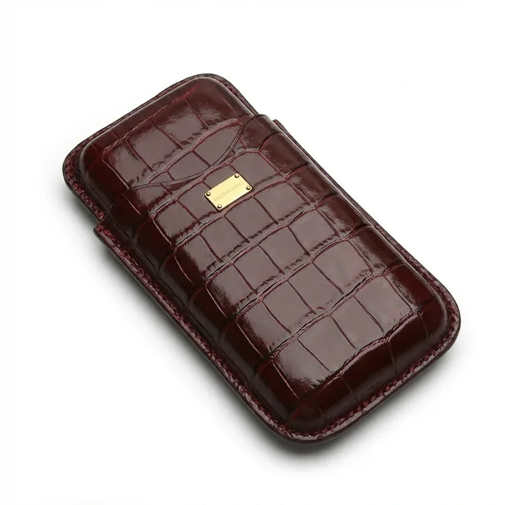 Luxury burgundy crocodile leather phone case with gold plaque, premium designer accessory