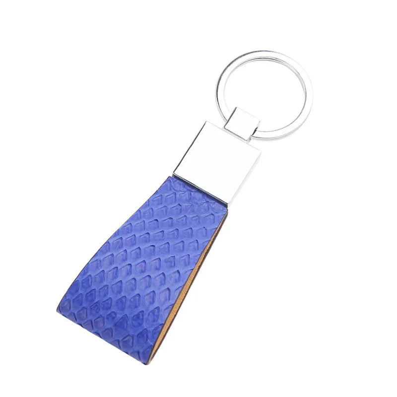 Blue snake skin key FOB on a white background