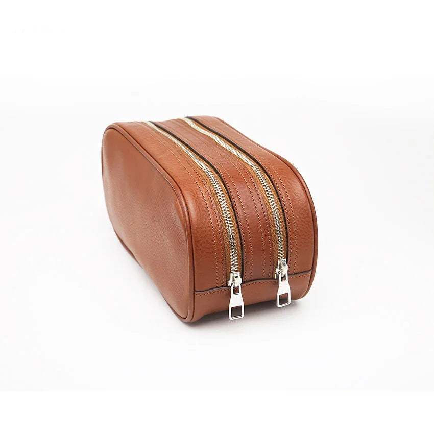 Close-up of the side of brown toiletry bag