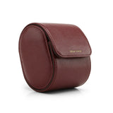 Brown leather watch storage cases with brand name on a white background