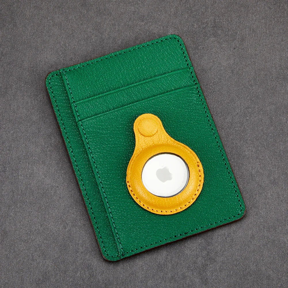 Green leather cardholder with yellow AirTag holder, premium accessory for tracking essentials