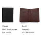 Two leather wallets, one black with lizard pattern on the outside and burgundy inside, the other open showing burgundy interior.