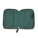 Green pebble leather zippered passport wallet on a white background