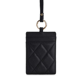 Black quilted leather ID card holder with gold ring and strap, luxury accessory for work or travel