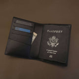 Unbranded black Buttero leather RFID passport case interior view for wholesale and custom logo private label.