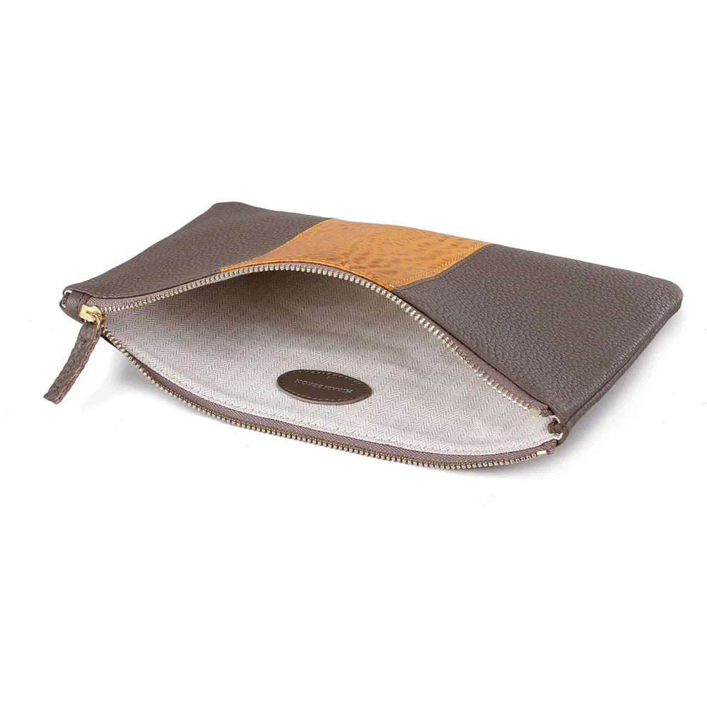 Brown leather clutch with tan accent, gold zipper, and herringbone lining for luxury accessories