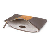 Brown leather clutch with tan accent, gold zipper, and herringbone lining for luxury accessories
