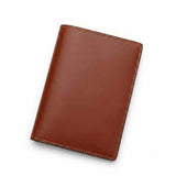 Brown Italian Buttero leather passport wallet front cover, private label premium leather travel essentials supplier.